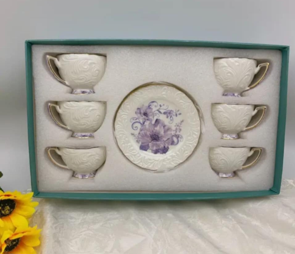 Elegant Porcelain Tea Cup Set – Floral Embossed Design (6 Cups + Saucer)