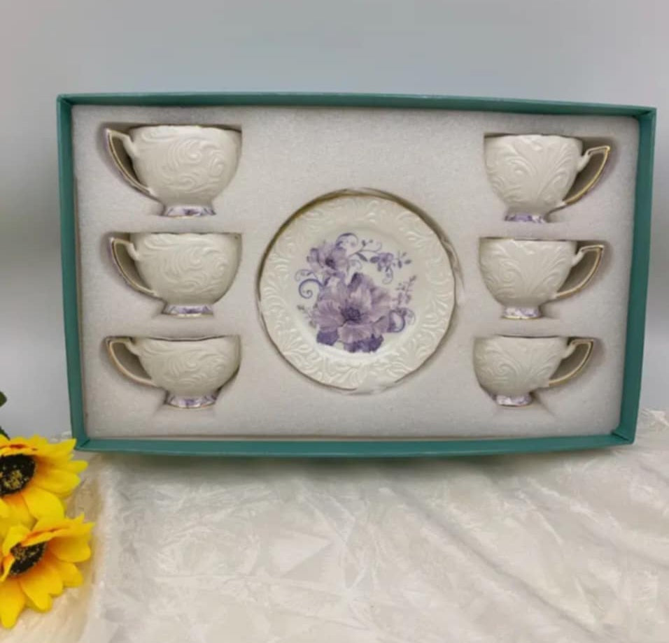 Elegant Porcelain Tea Cup Set – Floral Embossed Design (6 Cups + Saucer)